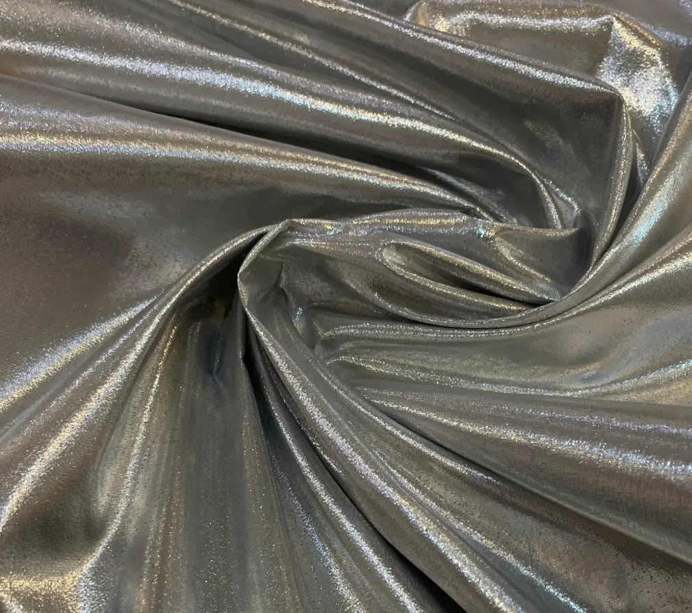 Luxurious gold lamé tissue fabric with intricate border work showing metallic shimmer